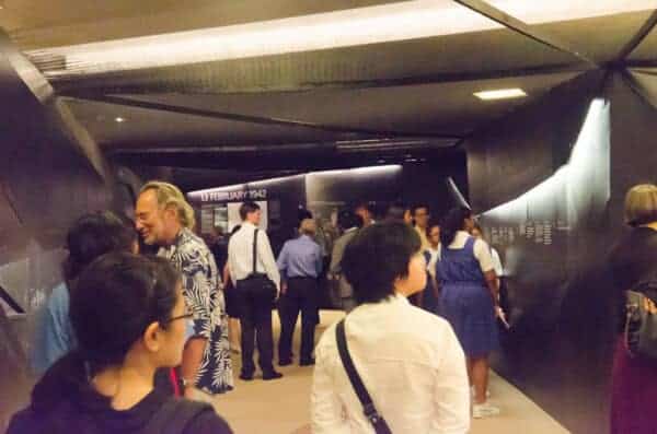 Visitors entering the exhibition area made to resemble a trench