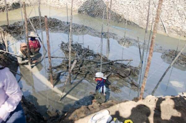 Archaeologists investigating a wooden structure, discovered during their search for the ship's stern.