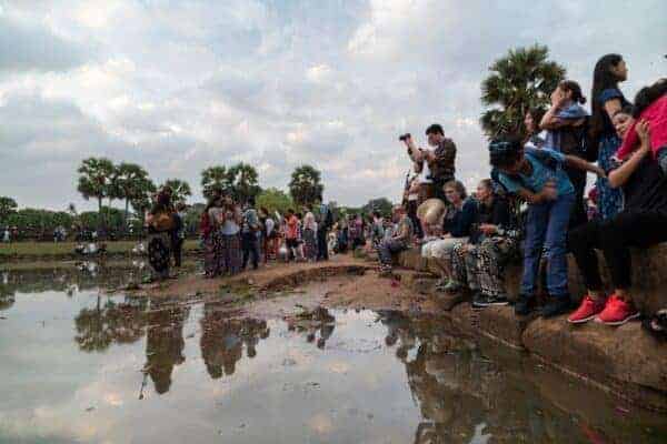 Tourists at Angkor Wat. Stock photos from Shutterstock / daphnusia